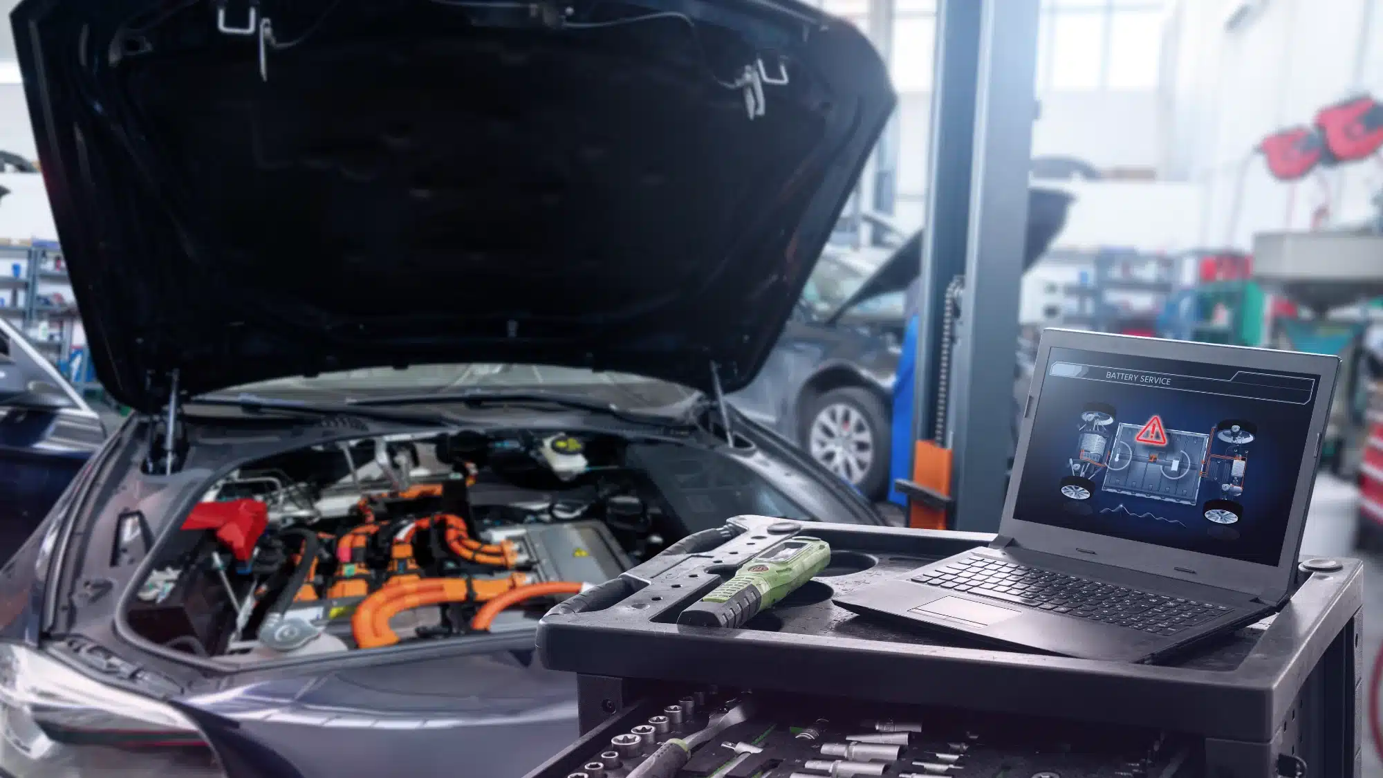 A skilled technician uses specialized diagnostic tools to inspect a European luxury car's engine.