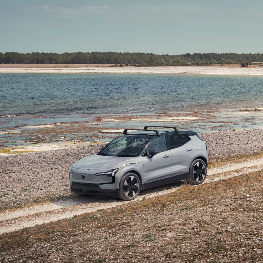 A sleek 2026 Volvo EX30 electric SUV parked on a scenic Connecticut road.