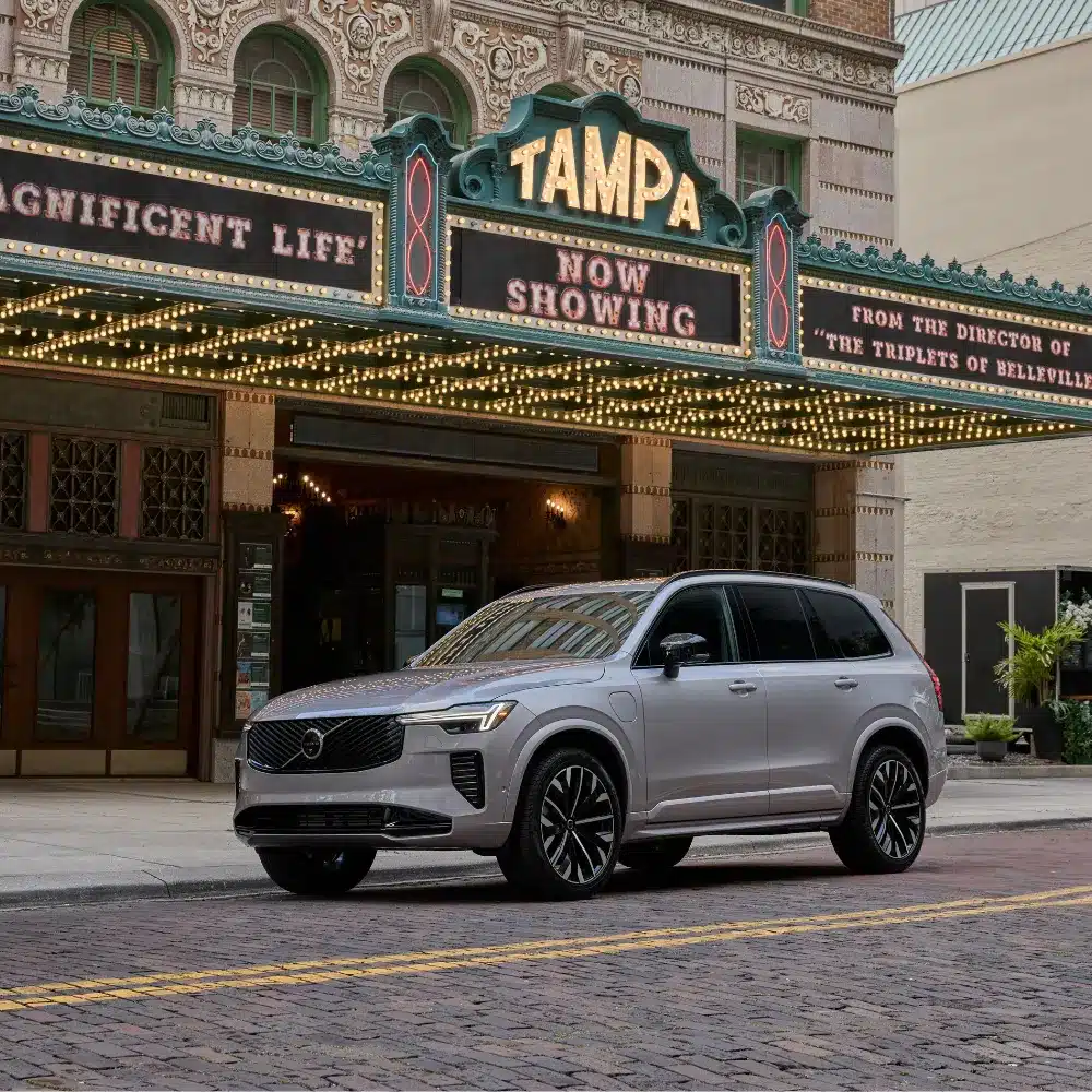 A person test driving a new Volvo at a dealership in Hartford, Connecticut.